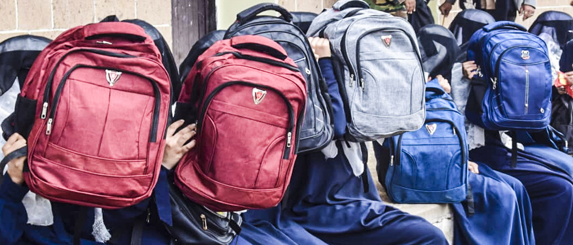 Distributing school supplies in 11 schools to 7,362 students and 241 teachers in the Al-Qafr district